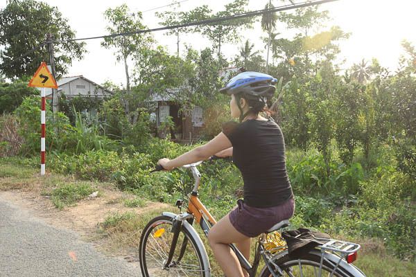 Cycling amongst fruit orchard garden in Mekong